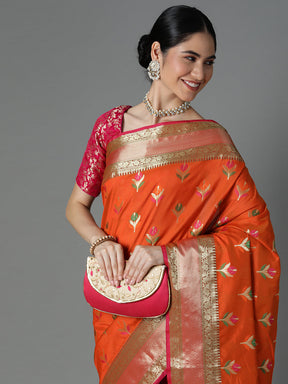 Features A Radiant Silk Blend Saree With Jacquard Ethnic Buttis All Over