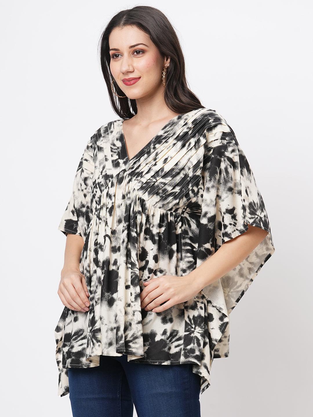 An Oversized Summer Kaftan Top In The Tie N Dye Print.